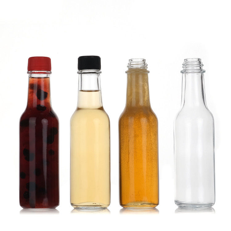 Fábrica mayorista 5 oz 8 oz botellas Woozy salsa de ketchup pimienta botella de vidrio con tapa de Pp