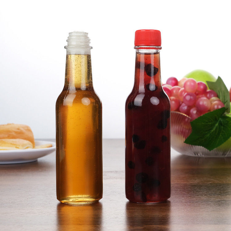 Fábrica mayorista 5 oz 8 oz botellas Woozy salsa de ketchup pimienta botella de vidrio con tapa de Pp